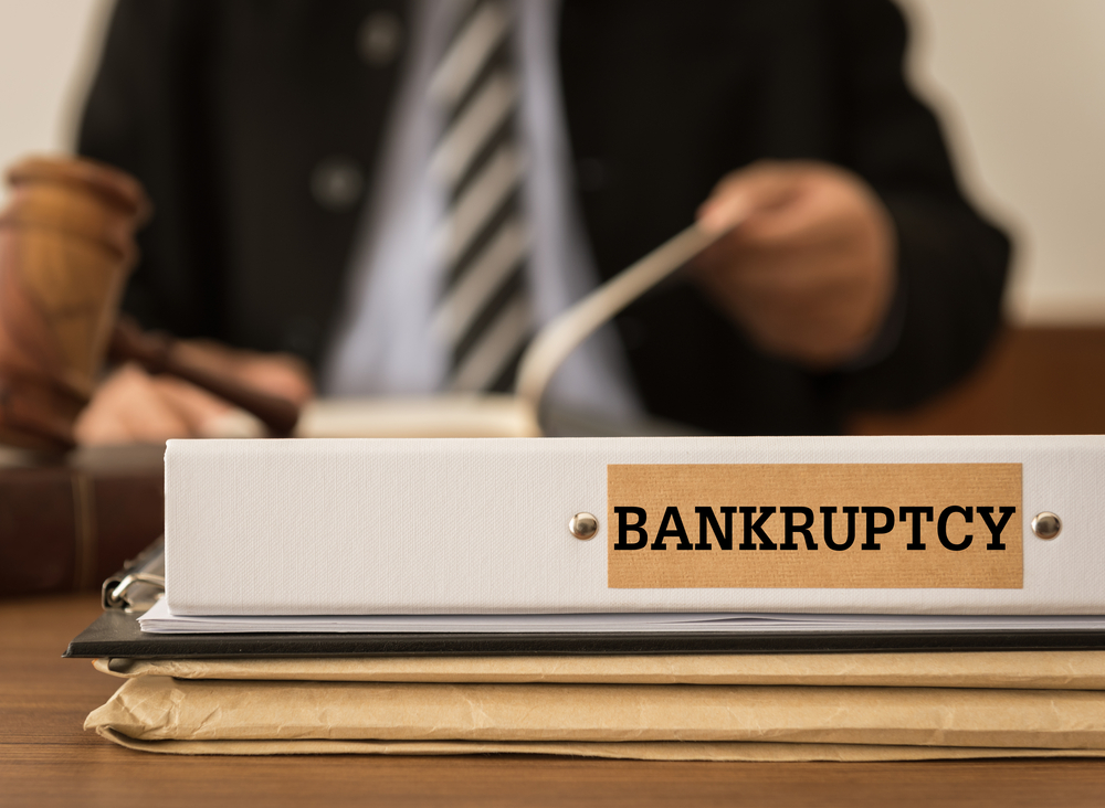 Photo of Bankruptcy Documents and a Lawyer