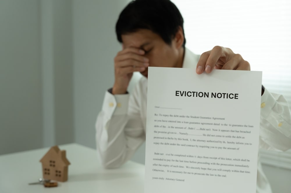 Eviction Notice Person Holding Eviction Notice Paper